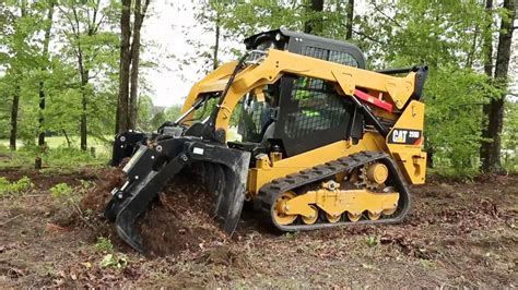 caterpillar skid steer grapple attachment|skid steer grapple rake attachment.